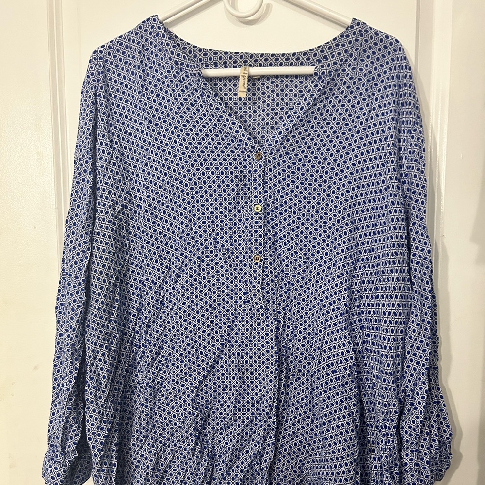 White and blue blouse.